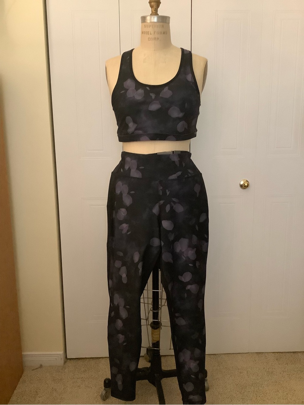 Hype Black Sports Bra and Leggings Set with Subtle Purple Floral Print
